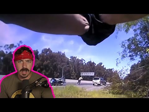 AMAZING shot made by motorcycle officer after taking fire
