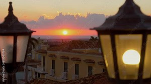 Sunset, Caribbean in a tropical climate. View from observation deck terrace of a beautiful sunset in Caribbean city of Trinidad, on island of Cuba, overlooking the ocean. Sunset Calm Tranquility Scene