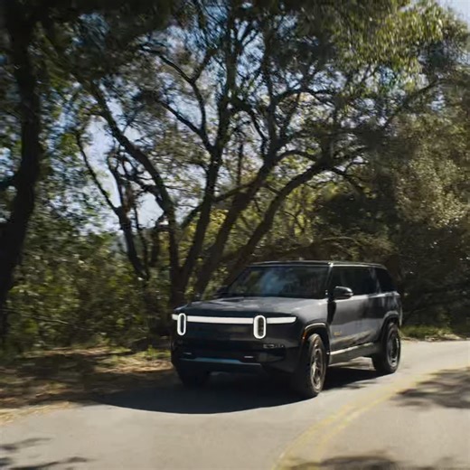 Plan ahead. Or don’t. Our latest software update introduces Charger Reliability Scores, an industry-first feature that automatically routes you to the best chargers available so you can confidently go wherever adventure leads you. Learn more at rivn.co/peaceofmind | Rivian