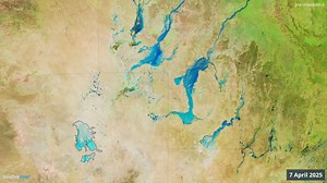 Watch desert floodwaters gushing towards Lake Eyre