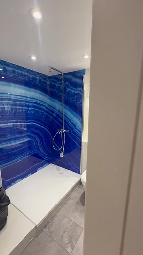 Looking to upgrade your bathroom? Our shower glass splashbacks are not only stunningly beautiful, but they're also a modern alternative to traditional tiling. Say goodbye to grout and hello to the sleek design. Get in touch for your complimentary quotation, and let's schedule a no-cost measurement session today! #bathroomupgrade #sleekdesign #showerglass | CreoGlass