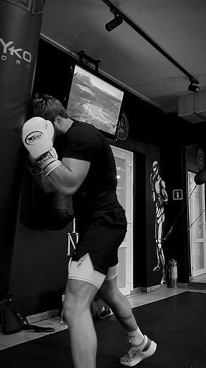 Intense Boxing Workout Session in a Modern Gym