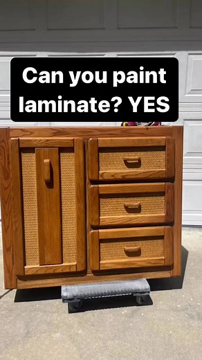 I had a vision for this outdated dining room buffet the second I saw it! It’s Bassett brand, which is a well known, quality furniture brand. Even so, the top of this was laminate. Sometimes it’s hard to tell between real wood, laminate, veneer, etc. Laminate feels very smooth and plastic-like. On the back side, you can see a thin lip of laminate on top of pressed together board. The key to painting laminate is to take that shine away using 120 grit before priming with two coats of shellac primer