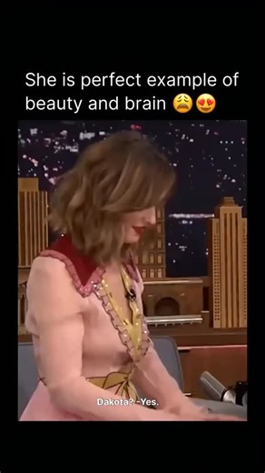 Fame & Icons Daily on Instagram: "Dakota Johnson famously showcased her acting skills on The Tonight Show Starring Jimmy Fallon by introducing “The Acting Game” in a January 2016 appearance. She explained that it was a game she played with her family. … The rules were simple: one person gets a fake scenario and has to act out their reaction while answering an imaginary phone call. Johnson herself demonstrated first. One notable scenario involved her fiancé, Darth Vader, calling to say he was lea