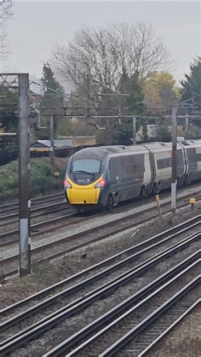 Avanti Class 390 passing.