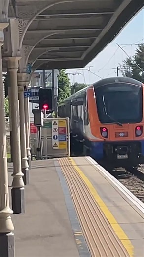LO class 710 Aventra passing the station