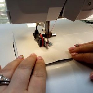 Tired of manually sewing a buttonhole? Watch to learn how you can sew one quickly using the Sensor One-Step Buttonhole Foot! | Viking Sewing Gallery