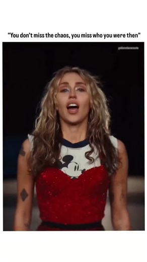 Discover Good Song | Music | This video clip features a close-up of singer Miley Cyrus performing with intense emotion against a dark, minimalist background. She is... | Instagram