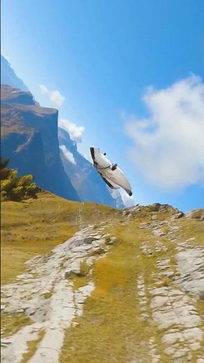 Thrilling Wingsuit Flight Over Stunning Mountain Scenery