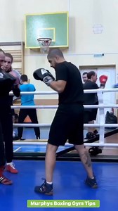 Coach Shkola show how to do a check hook on the back move | Murphy's Boxing Gym