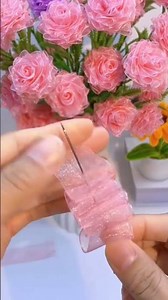 the process of making a flower shape from cloth by sewing it correctly