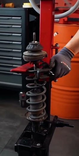 Coil spring compressor