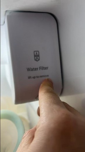 How to remove water filter from whirlpool fridge?