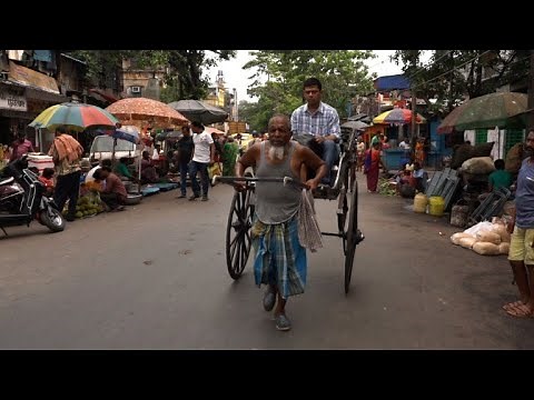 Métiers en voie de disparition: tireur de pousse-pousse en Inde