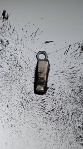 1.2M views · 21K reactions | You can clearly see the curves from from above and below: pieces that are on the outer orbit of the ring come around to reach the magnet, continuing to turn as they get closer the farther they are. You can also observe the increase in speed as they get closer, and the difference of speed depending on the size of the objects. | The Slow Mo Guys | Facebook