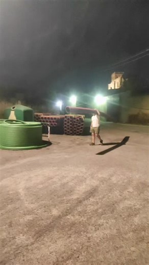 Balancing PVC Pipe Walking Challenge at Night