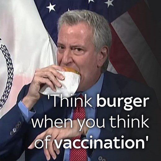 New York City mayor Bill de Blasio eats burger and chips during a press conference to encourage people to get vaccinated - and get a free meal 🍔 Latest news from the US here: https://news.sky.com/us | Sky News