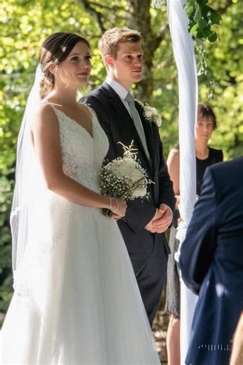 𝗠𝗬 𝗙𝗔𝗧𝗛𝗘𝗥-𝗜𝗡-𝗟𝗔𝗪 𝗙𝗢𝗥𝗖𝗘𝗗 𝗠𝗘 𝗧𝗢 𝗞𝗡𝗘𝗘𝗟 𝗔𝗧 𝗠𝗬 𝗢𝗪𝗡 𝗪𝗘𝗗𝗗𝗜𝗡𝗚 – 𝗛𝗜𝗦 𝗥𝗘𝗔𝗦𝗢𝗡 𝗪𝗔𝗦 𝗧𝗥𝗨𝗟𝗬 𝗦𝗛𝗢𝗖𝗞𝗜𝗡𝗚 I was about to marry the love of my life. It was my wedding day, set in a beautiful outdoor venue near an elegant manor and an ancient forest. The ceremony was perfect, the weather was delightful, and everything seemed to be going smoothly. Just as we were about to exchange vows, my father-in-law stepped forward. ""Stop,"" he commanded. ""BEFORE