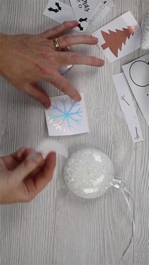 Adding vinyl to round ornaments can be tricky! Try adding slits to your transfer tape to help the vinyl around the curves! #cricut #cricuttips #cricuthacks #christmascrafts | Angie Holden The Country Chic Cottage