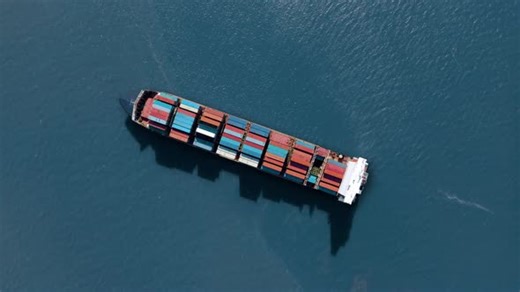 Aerial View of Cargo Ship Carrying Shipping Containers