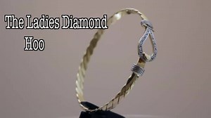 9ct Gold Ladies Diamond Hook Bangle. £475.00 Diamond Weight: 12 points Weight: 17.1 grams Circumference: 7.5 inches ( 19.05cm ) Width of twisted band: 0.16 inches ( 4mm ) Width of hook: 0.5 inches Available to purchase from our Facebook shop https://www.facebook.com/commerce/products/1085588531562957/ Alternatively, call store during opening hours on 01159500176, message us through Facebook or alternatively come into store. Available for home delivery within 3-5 working days. ( Whilst Stocks Las