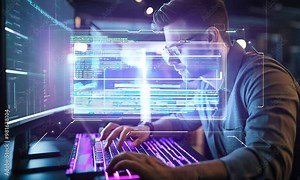 Coder works on interface holographic screen with coding and programming lines