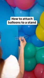 ✨Cher Can Do It✨ Balloon Shop on Instagram: "The EASIEST way to attach your balloons to a stand 🎈✨ Long skinny balloons work best, I like to tie the ends together to make a loop, then I slide that loop over one of my plastic clips. If you don’t have long skinny balloons, you can use a rubber band too (not as effective but it will still work!) #partyplanning #balloonartist #balloontips #balloontipsandtricks #balloons #balloondecor #balloontricks #balloontutorial #ballooneducation #partyideas #pa