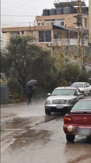 Car Splashes Water on Pedestrian - 1498646