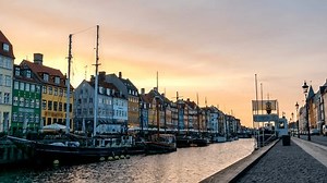 Copenhagen Denmark time lapse 4K, city skyline sunrise timelapse at Nyhavn harbour