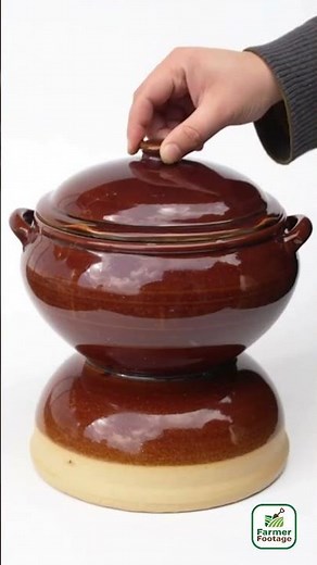 An ancient earthenware pot used for cooking food with steam.