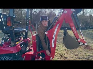How to operate a backhoe on a Massey Ferguson Tractor