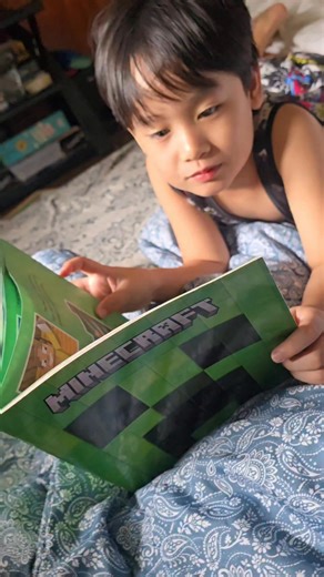 My cousin from the U.S. sent me this Minecraft book... and now I'm the pro reader pro builder! Every page feels like unlocking a secret level IRL. Watch me flip through like it's my new adventure map! | Alcres Grey