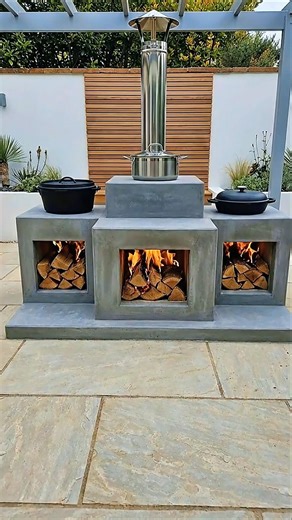 How to make a stove of minimalist concrete with a central metal chimney.