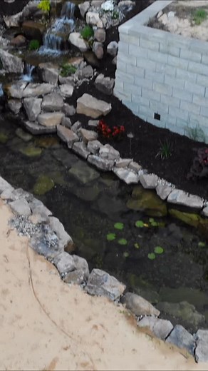 Imagine having a waterfall like this in your backyard⛲️ #sitepros #aquascape #waterfalls #sixflagsnusery | Site Pros Landscaping Inc.