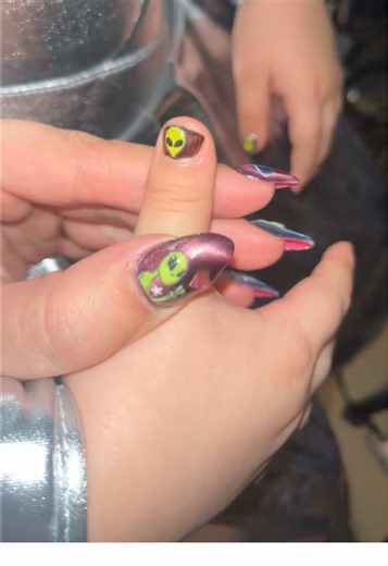E.t. Nails for my kiddo’s alien themed birthday party ! 👽✨ A lot of people have told me this is my best set yet. Definitely different from my usual style but they’re fun to stare at! One of my favorite parts about being a mom is surprising her. I had a lot of fun planning out her party and forcing my husband to match outfits 😂❤️ #aliensighting #extraterrestrial #starseedawakening #selftaughtnailtech #aliennails