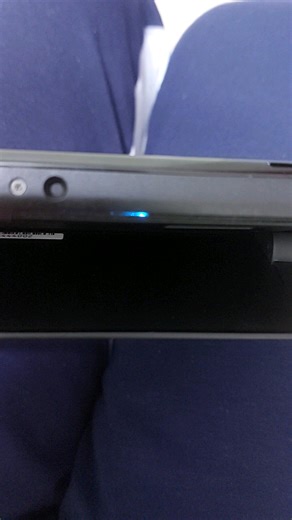 Switch OLED blue light flashing and green light but not booting