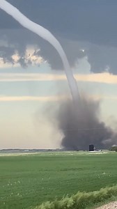 2.9M views · 55K reactions | The longest rope tornado I’ve ever seen! 勞️ Amazing capture by @NeilSerfas on Twitter—thank you for letting me share it, Neil! This stunning tornado touched down near D’Arcy, Saskatchewan, a few years ago. #Tornado #StormChasing #ExtremeWeather #SevereWeather #TornadoHunter | Ricky Forbes | Facebook