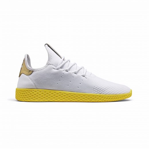 Both colourways of the Tennis Hu by Pharrell Williams are based on two of adidas’ most iconic tennis shoes. The white pair with green detailing is a homage to the Stan Smith while the yellow lacing, yellow sole and golden heel tabs are hallmarks of the Forest Hill. Available now. | adidas