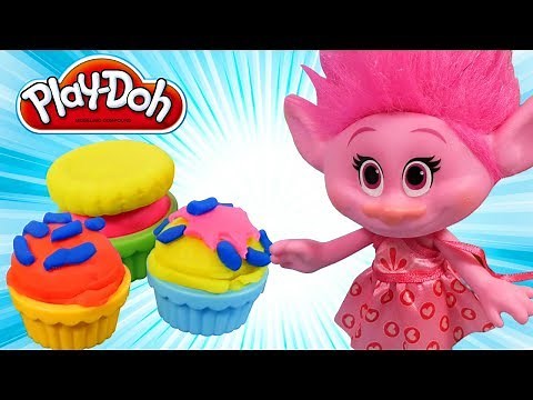 Baking a Play-Doh cake with Trolls toys.