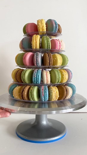 On Tuesday, we shared our rainbow macaron sugar cookies, now watch as @baked.by.steph builds a rainbow macaron tower! 🌈 We're really into colors and macarons this week. 😋 | Tastemade