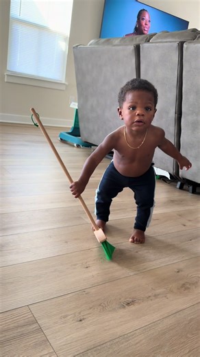 From the walker, to walking on his own, he’s always loved to sweep! Hope he stays this way 😂❤️ #labkidz #cleaningtiktok #fyp