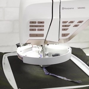 With the Ribbon Embroidery Attachment your DESIGNER EPIC™ 2 will guide and stitch down ribbon in all directions, creating beautiful dimensional embroideries. | Husqvarna Viking North America