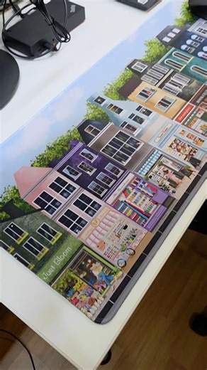 Hues and Scents Creative Studio on Instagram: "Bringing our beautiful shopfront design onto this desk mat because we wanted something colourful and cheerful on our own desk — something that makes everyday work feel a little lighter. The Shopfront Desk Mat is printed in a large format that brings character to your workspace. - Large size (80cm x 30cm x 0.6cm) — comfortable for laptop/ keyboard + mouse - Smooth surface, easy for everyday use. - Stain resistant and dust-proof with a non-slip backin