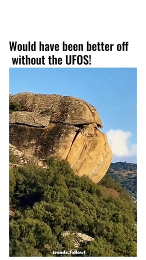 Viral Trending content on Instagram: "This X post shares a 12-second video of a black car gliding through a sunlit natural rock overhang amid lush greenery, creating a satisfying, ASMR-like drive that evokes peaceful exploration in a rugged landscape. The footage's high contrast—bright sandstone arch against the dark vehicle—sparks viral humour in replies, with users joking about UFO sightings, alien bases, or "Open Sesame" cave entrances, boosting 2.8 million views in 48 hours. Posted by @noteb