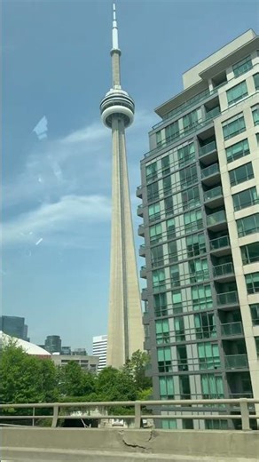 Touching the Sky: CN Tower and Downtown Heights