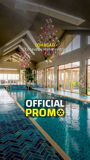 Buildofy on Instagram: "Set in the hills of Lonavala, this 20,000 sq. ft. residence merges contemporary luxury with traditional Indian craftsmanship. Spanning five acres, Lohagad is designed to blend seamlessly with its surroundings, offering panoramic views of the Pawna Dam and the natural landscape. The architectural design features a cross-gabled roof, expansive windows, and strategically placed skylights that bring in natural light. Locally sourced materials, including Indian gold marble and