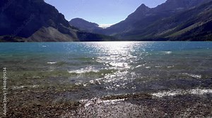 Bow Lake lakeshore in summer sunny day. Bow Glacier, Banff National Park, Canadian Rockies, Alberta, Canada.