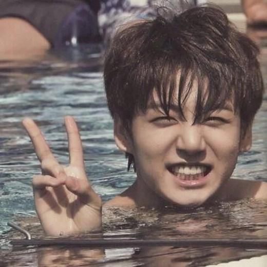Jungkook Peace Sign in the Pool Video
