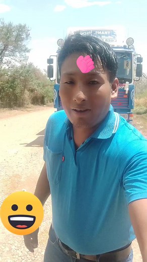 Creative Hand Gestures in Front of a Blue Truck