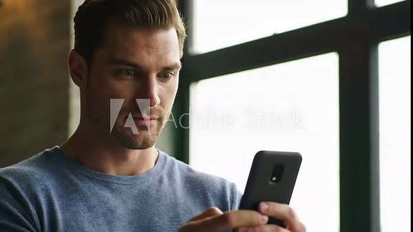 Triumphant Man Celebrates a Huge Success or Online Win with an Ecstatic Fist Pump and Shout.